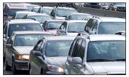 Image shows cars in heavy traffic.