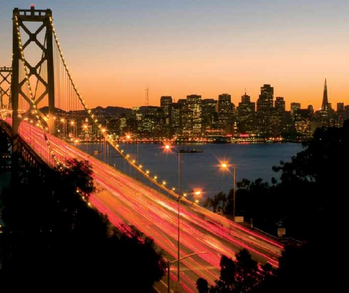 Photo of the San Francisco Bay Bridge at sunset.