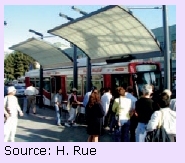 Photo of a rapid transit bus stop. Source: H. Rue.