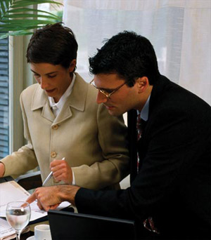 Photograph - This image shows professionals evaluating performance measures.