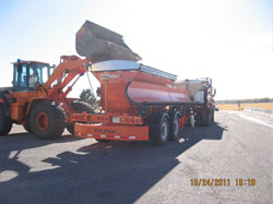 Figure CO-2 is a photo of a tow plow being loaded with salt.