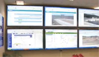 Photo of six computer screens in a traffic operations center.