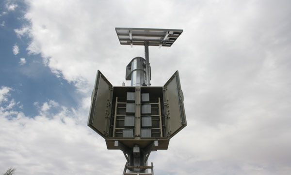 Figure 25. Photo. Pole-mounted batteries installed at Ciudad Juárez, Mexico. This photo shows hardware installed on the Ciudad Juarez side, specifically the pole-mounted batteries.