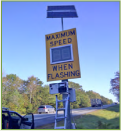 A variable message sign at the side of a roadway.