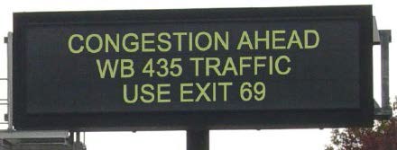 Picture of dynamic message sign indicating congestion ahead and traffic heading to Route 435 should use Exit 69.