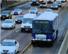 Picture of Bus on Shoulder operation in Illinois, showing a bus operating in the left shoulder.