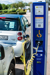 a car using intelligent transportation systems (ITS) at a gas station