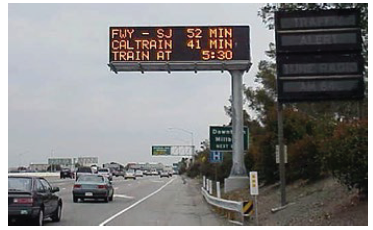 Photo depicts freeway and transit travel times on a dynamic message sign