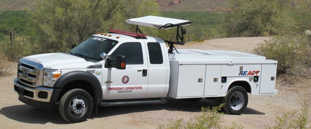 Title: Figure 6. Photo. Regional Emergency Action Coordinating Team Regular Response Vehicle. - Description: The figure shows a photo of a side view of the Maricopa County Arizona Regional Emergency Action Coordinating Team Regular Response Vehicle. The photo is courtesy of the Maricopa County Department of Transportation. 