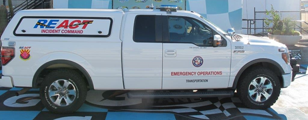 Title: Figure 7. Photo. Regional Emergency Action Coordinating Team Incident Command Vehicle. - Description: The figure shows a photo of a side view of the Maricopa County Arizona Regional Emergency Action Coordinating Team Incident Command Vehicle. The photo is courtesy of the Maricopa County Department of Transportation. 