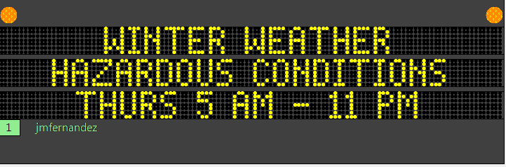 This photo is of a neon sign from the Wyoming DOT Traffic Management Center. The sign reads "winter weather hazardous conditions thurs 5 am - 11 pm."