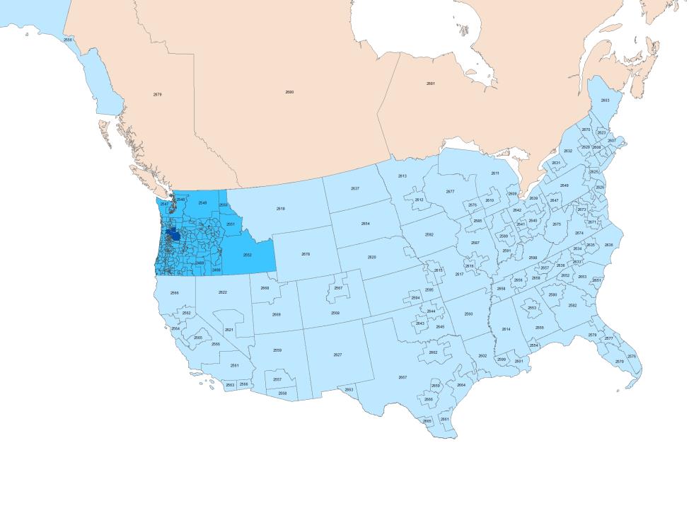 This figure shows Portland Metro model zone system in North America. Oregon and surrounding states zones are in blue, Metro model region zones are in dark blue, Other parts of the US zones are in light blue and Canada zones are in orange. The colors are for easier visibility and do not have any other meaning.