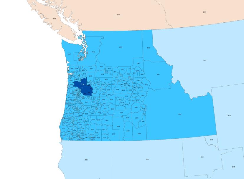 This figure shows Portland Metro model zone system in Oregon and surrounding states. Oregon and surrounding states zones are in blue, Metro model region zones are in dark blue, Other parts of the US zones are in light blue and Canada zones are in orange. The colors are for easier visibility and do not have any other meaning.