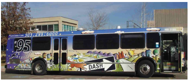 A transit bus with colorful art painted on the side.