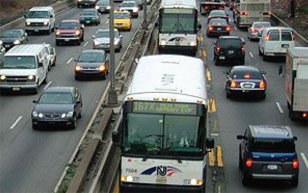 Figure 24. Photo of a busy highway with buses using a dedicated bus lane.