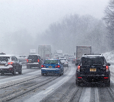 Figure 3. Photo of traffic stopped on a highway in a snowstorm.