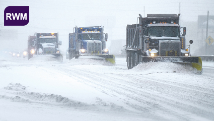 Photograph of snow plows identifying with the Road Weather Management CMF. (Credit: Bart Sadowski/Shutterstock)