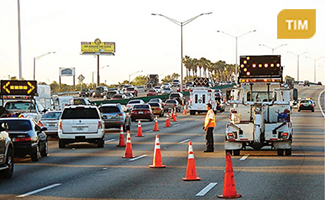 Photograph of temporary traffic controls put in place on a freeway identifying with the Traffic Incident Management CMF. (Credit: www.floridatim.com)
