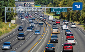 Photograph of a busy freeway identifying with the Traffic Management CMF. (Credit: https://www.dksassociates.com/portfolio/odot-or-217)