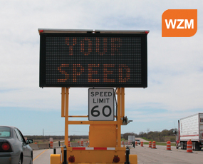 Photograph of a work zone with a speed trailer identifying with the Work Zone Management CMF. (Credit: TTI Communications)
