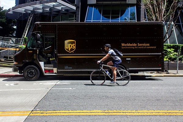 a UPS package truck parked at the curb in Seattle