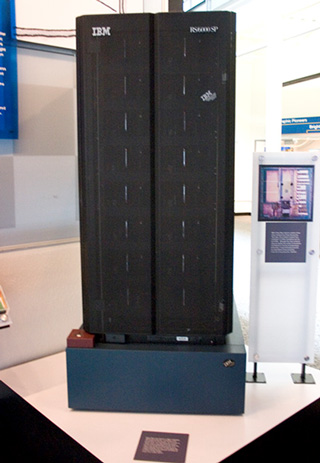 Figure 6 is a photograph of IBM's Deep Blue, the first supercomputer to beat a human at chess, sitting on top of a table.