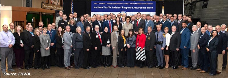 Figure 2 is a photo that shows the summit participants at the National Museum of the U.S. Navy.