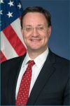 A headshot of Acting Administrator James C. Owens.