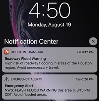 Figure 2. Example of a Houston TranStar push notification on a subscribed traveler's phone screen announcing a roadway flood warning.