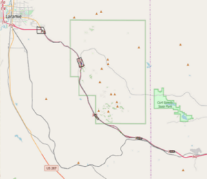 Map shows the Vissim model location for the variable speed limit zone between Cheyenne and Laramie. The Vissim model shows locations lane additions and drops and locations of rest areas and parking areas.