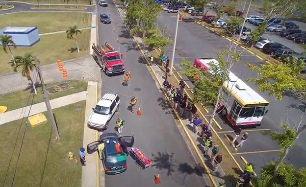 An aerial photograph of an in progress training in a parking lot.