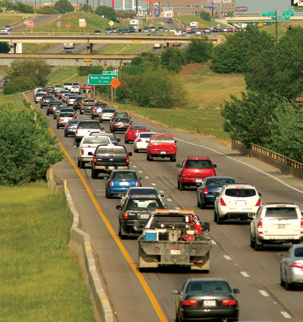 Photo of traffic on a two-lane highway.