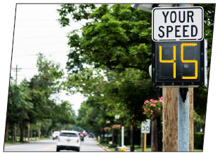 Post-mounted dynamic speed feedback sign indicates the speed of the driver approaching the sign is 45 mph.