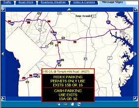 a traveler information web page indicating a changeable message sign stating "FedEx parking permits only – use exits 15B or 16" in one phase and "cash parking – use exits 15A or 16" in a second phase