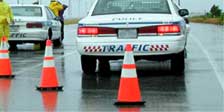 traffic police blocks road access with cones and police cars