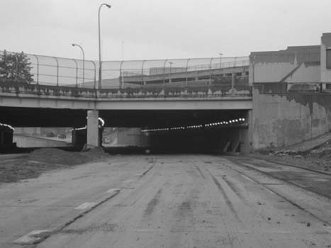 The title picture shows a pedestrian-protected overpass for the M-10 Lodge Freeway in Detroit.