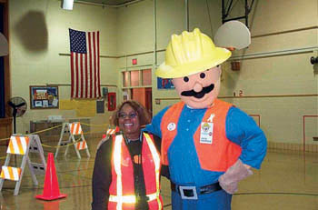 Photo of Jack Hammer character with elementary school principal June Tyler
