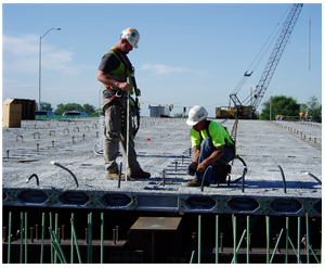 Photo of workers installing a Partial Depth Precast Deck