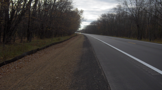 Shoulder and centerline corrugations on finished roadway.