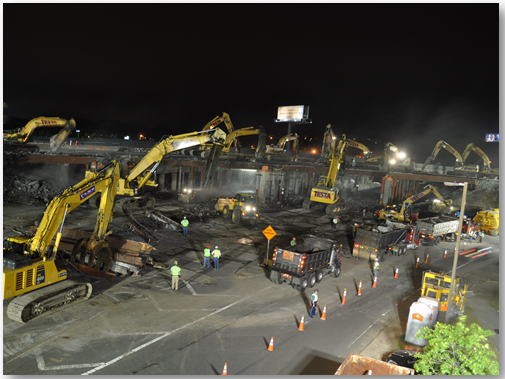 A large-scale demolition of the overpass.