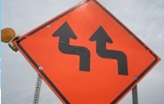 Photo of a lane shift sign.