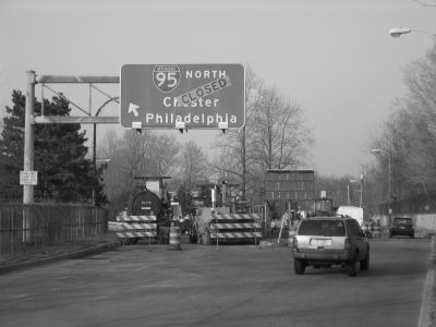Figure 15 shows an entrance to I-95 in Delaware closed to traffic.  A sign that says I-95 North Chester Philadelphia is covered with a CLOSED sign.  Equipment blocks the entrance ramp.