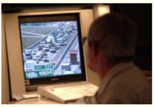 The image shows a screen for monitoring traffic taken over the shoulder of a viewer.