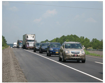 Vehicles in a queue on a divided interstate.