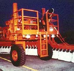photo of a moveable barrier transfer machine